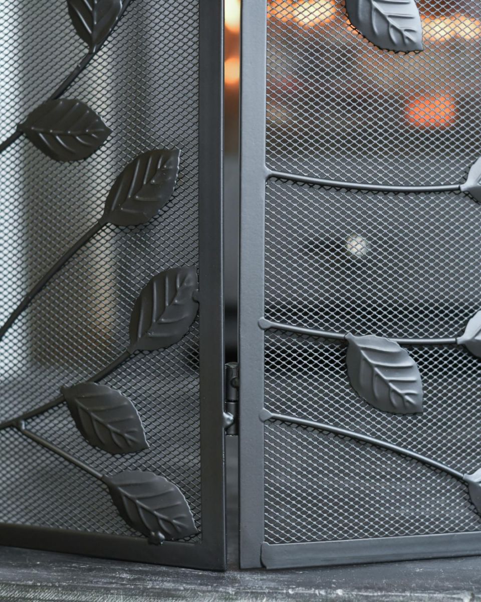 Close Up Of Black Rectangular Three Fold Fire Guard with Leaf Pattern Edges