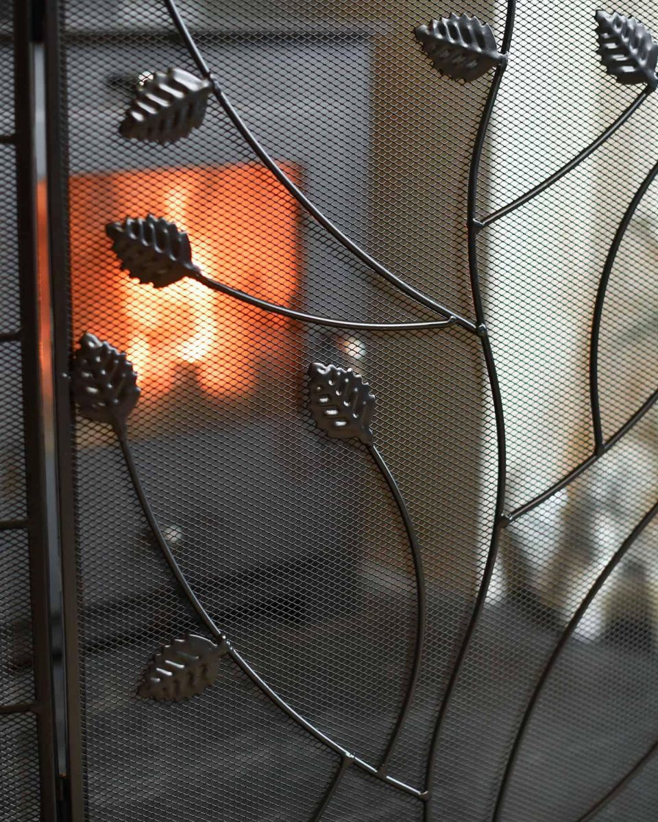 Close-Up of Leaf Pattern on Black Three Fold Fire Guard