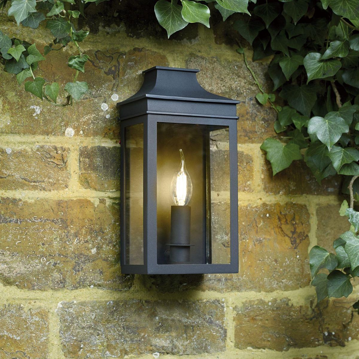 Black Traditional Flush Wall Light in Situ on a Wall