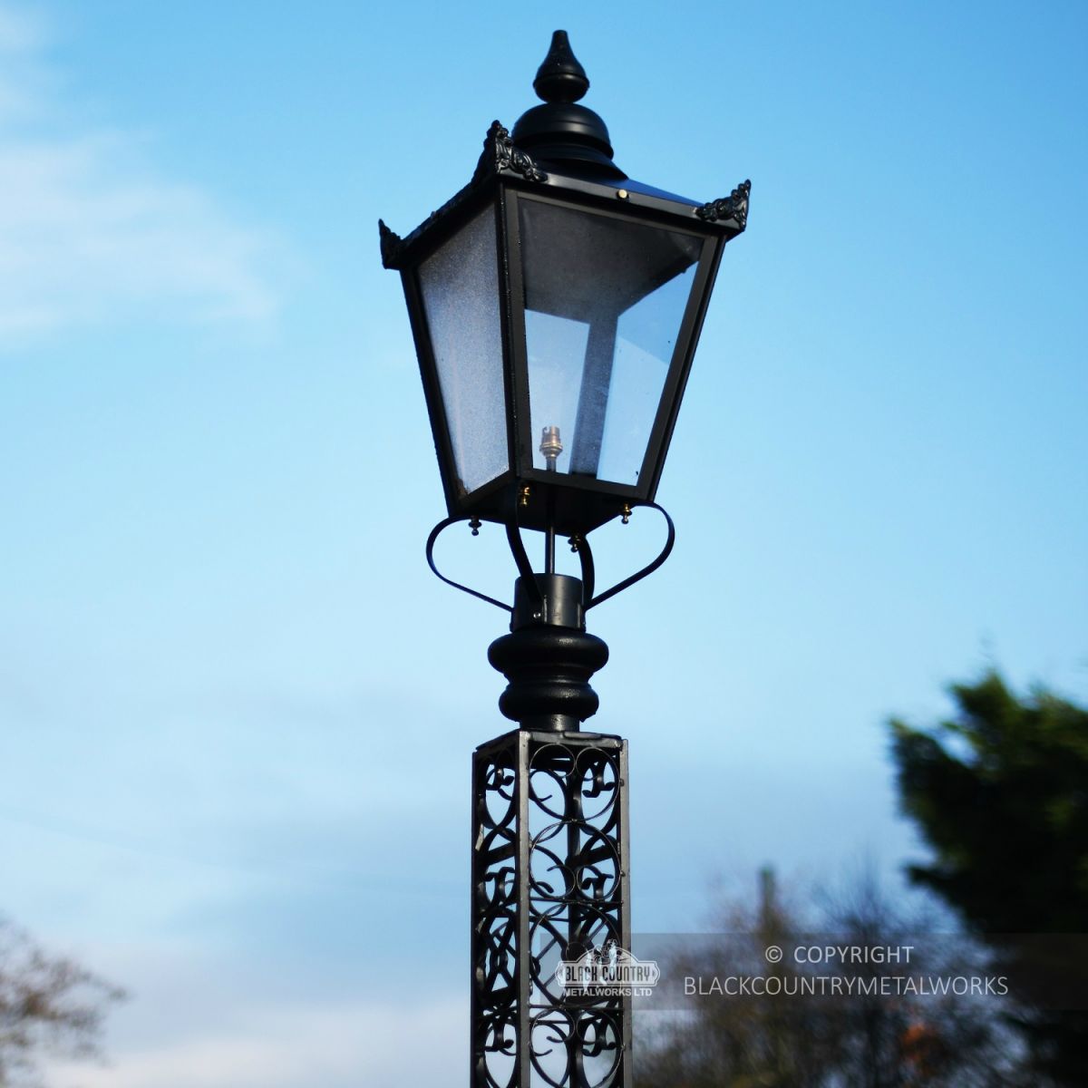 Black Victorian Lantern On Scrollwork Tower