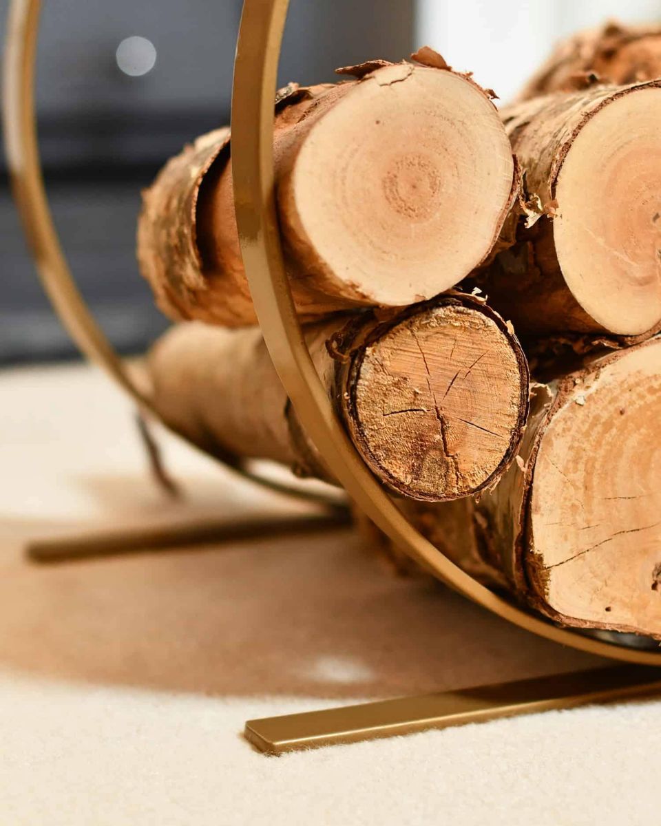 Close-Up of Blacksmith Brass Finish Curved Log Rack in Situ