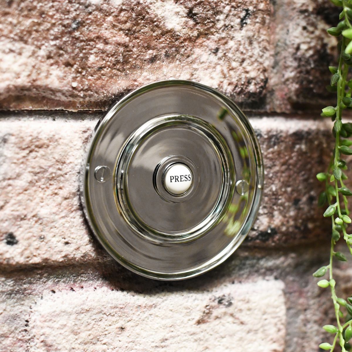 Chrome door furniture, circular door bell