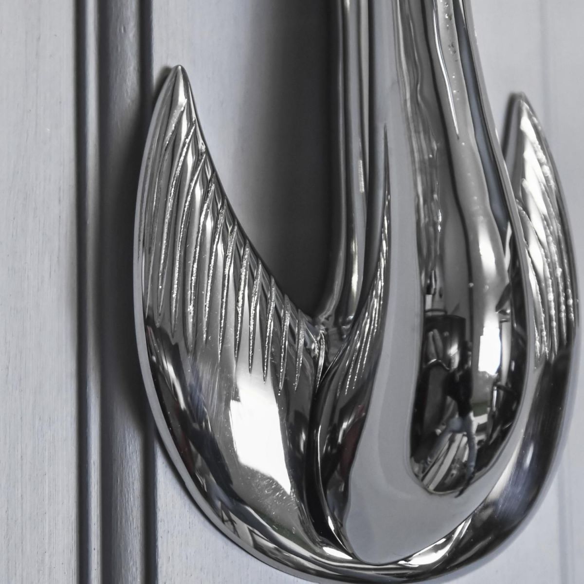 Close-Up of Bright Chrome Finish on "Odette" Swan Door Knocker