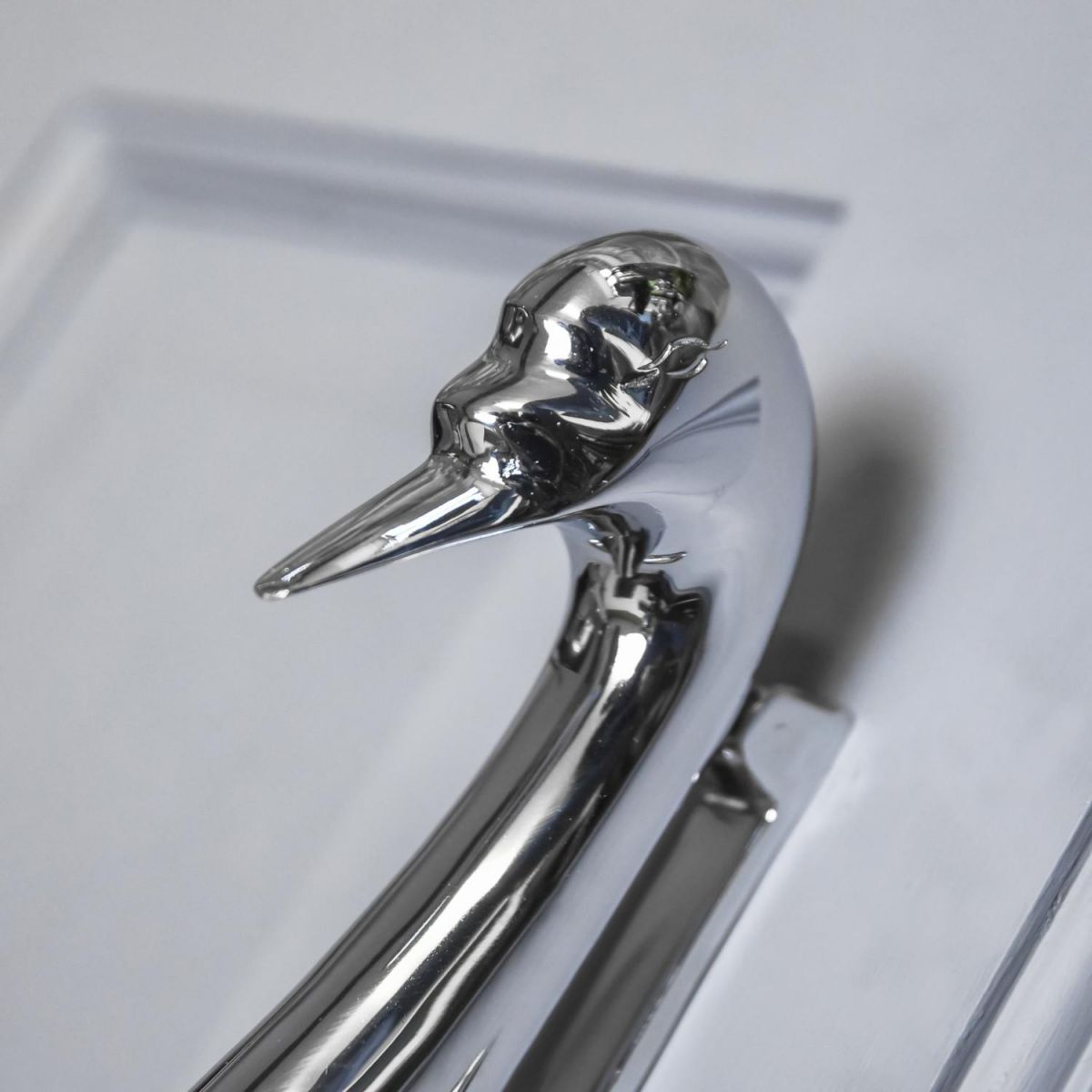 Close-Up of Bright Chrome Swan Head