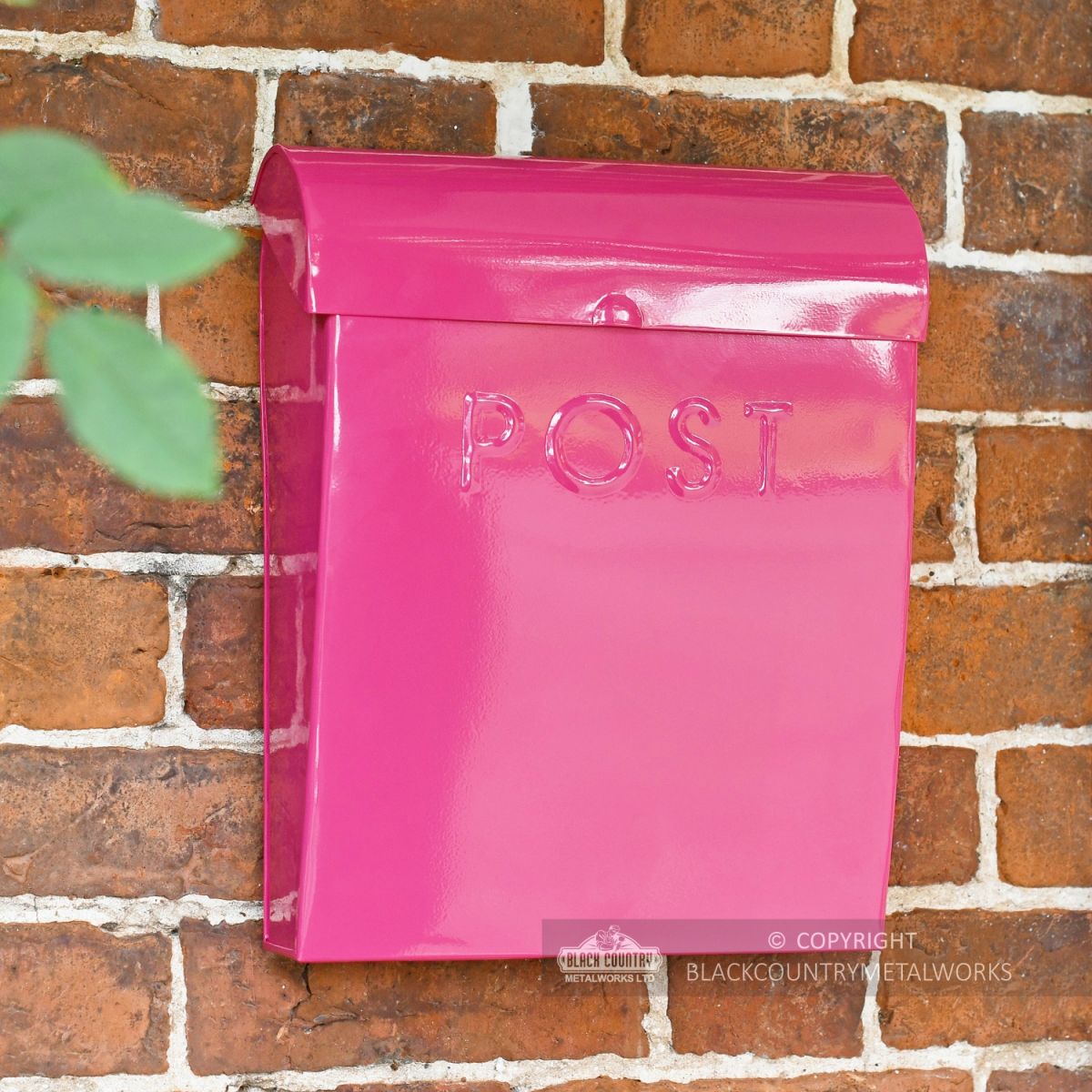 “Persian Summer” Bright Pink Contemporary Post Box in Situ on the Front of a House