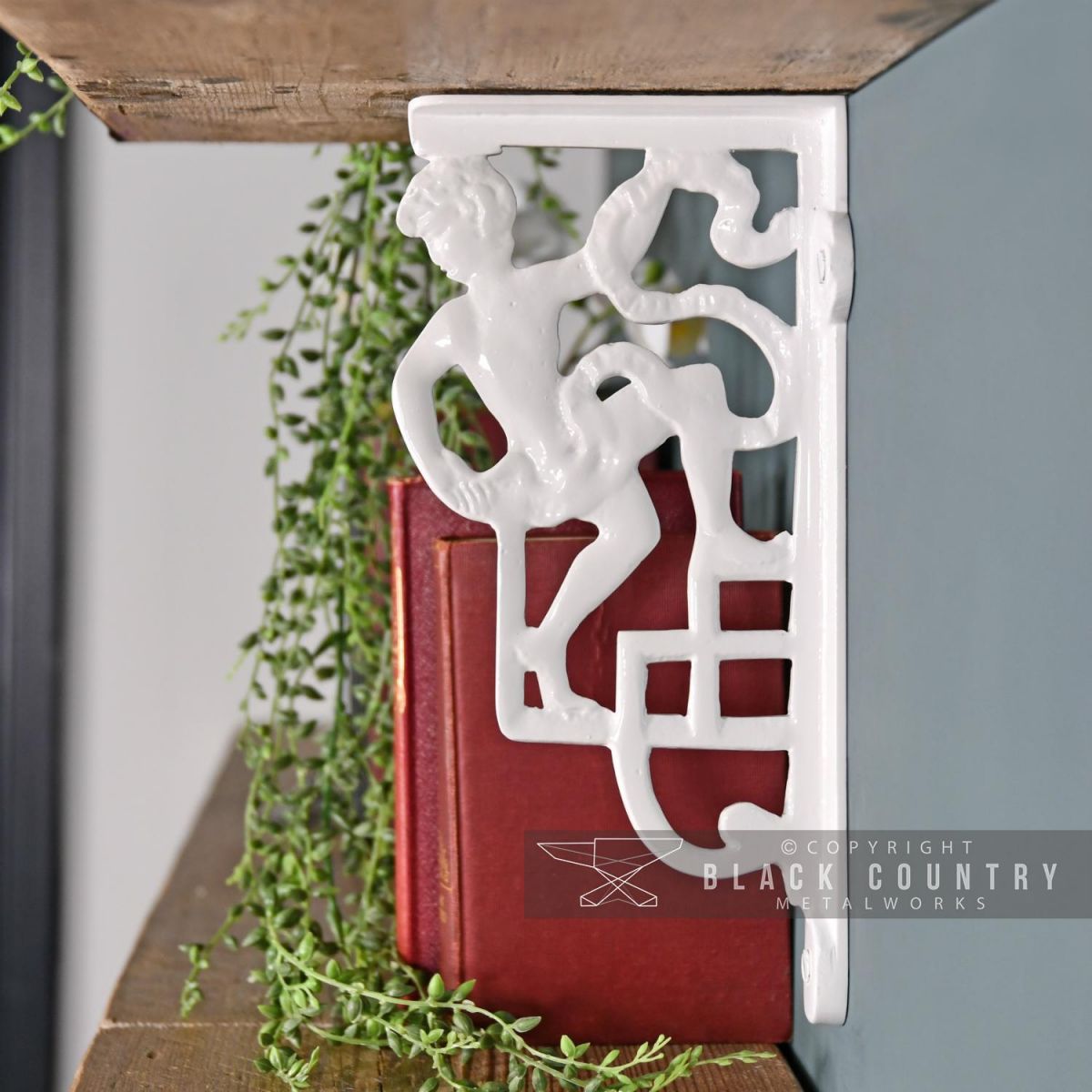 White Climbing Man Design Bracket 25 x 12cm