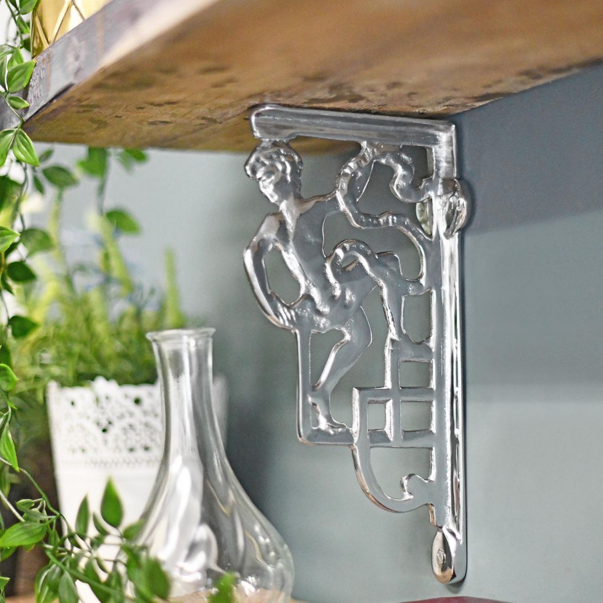 Bright Chrome Climbing Man Design Bracket