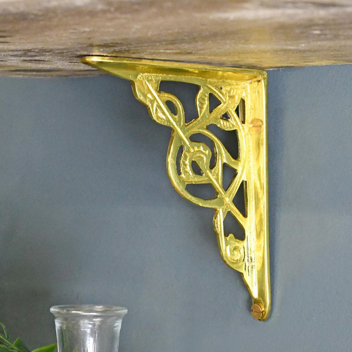 Polished brass shelf bracket