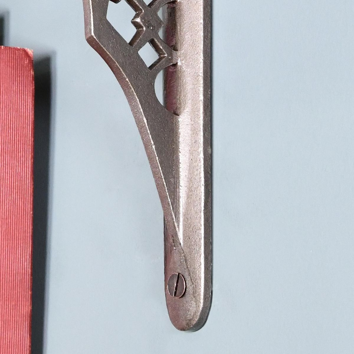 Close-up of the Fixing Holes on the Cast Iron Trellis Patterned Shelf Bracket
