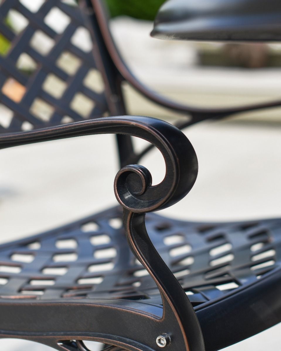 Close up of curved armrest on chairs