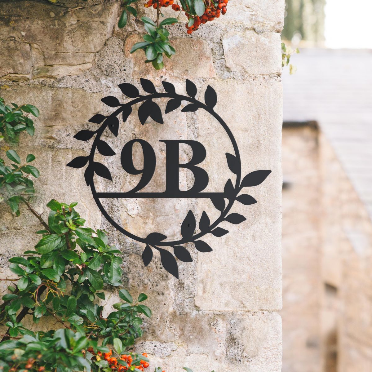 Circular Leaf House Number Sign in Situ on the Side of a House