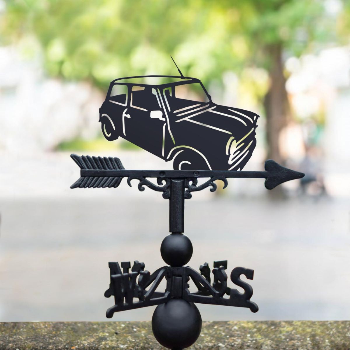 Classic mini weathervane in the park