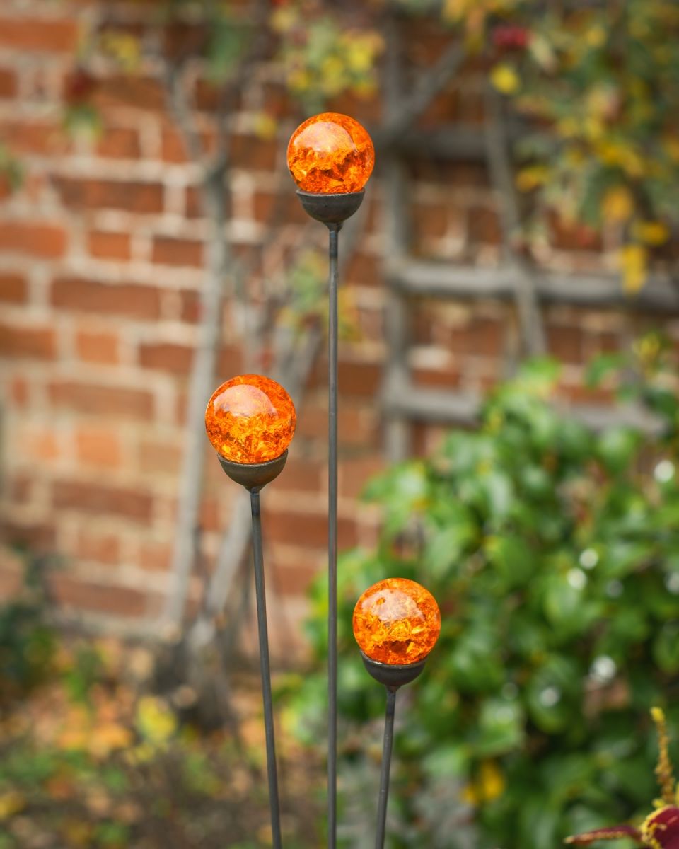 Close up of all 3 suncatcher garden ornaments