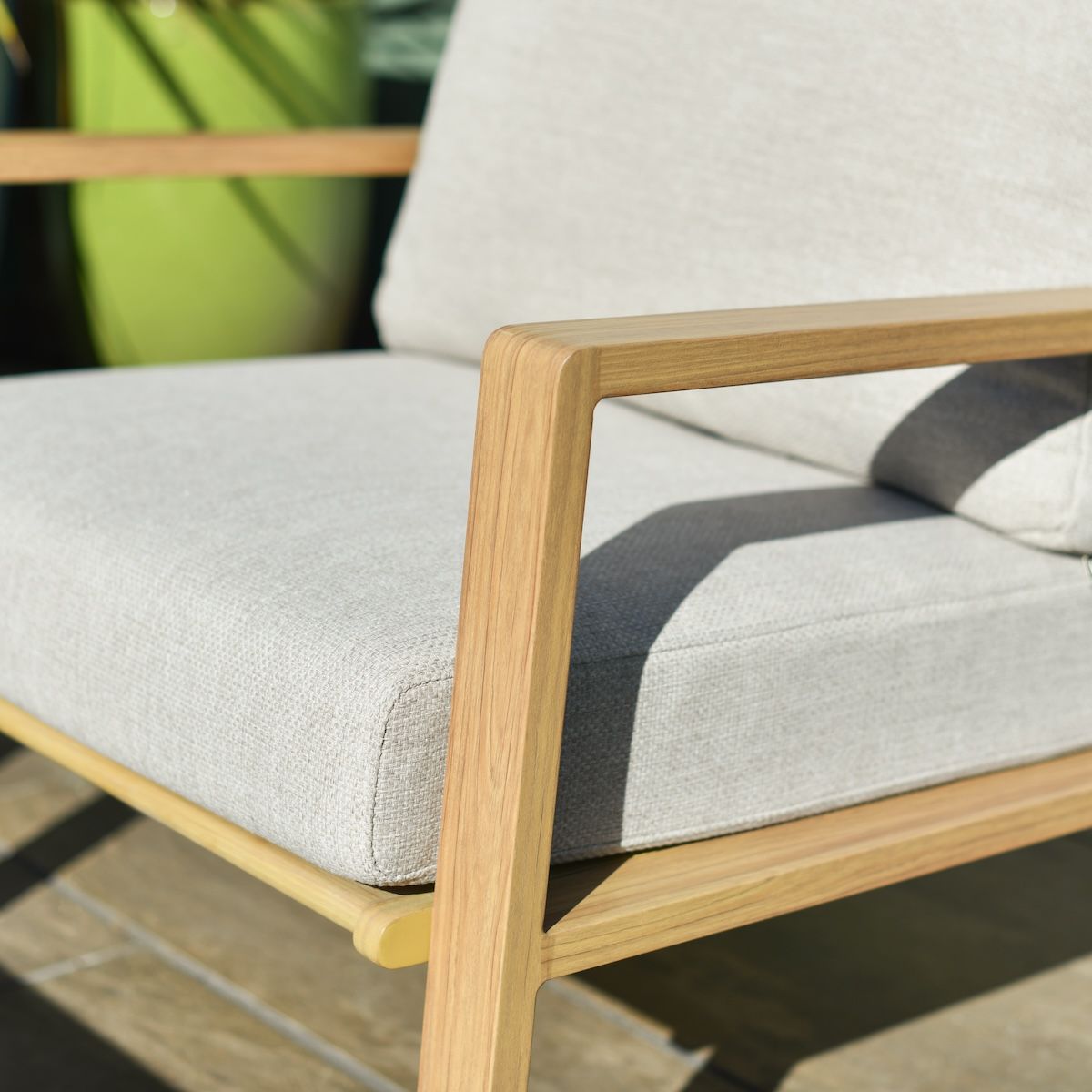 Close up of wood effect detailing on five seater outdoor lounge set Close up of wood effect detailing on five seater outdoor lounge set