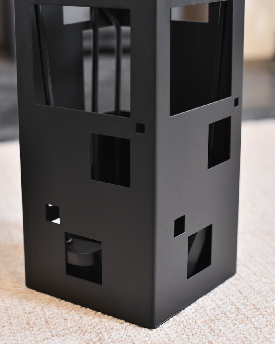 Close up of black detailing on fireside companion set