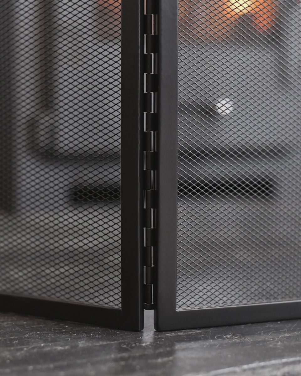Close up of connections on triple fold black fire guard