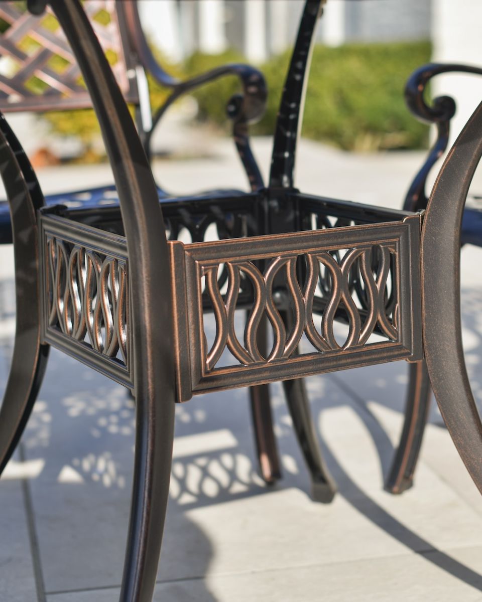close up of base of table on square table and chair set