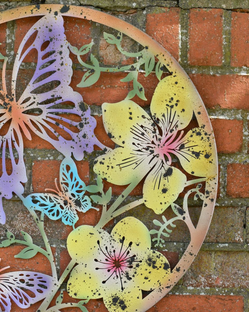 Close up of colourful flower detail on outdoor wall art