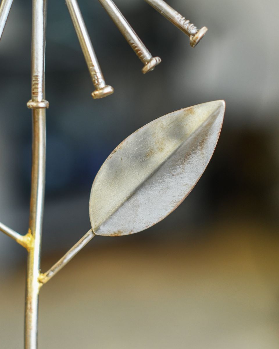 Close up of intricate leaf detail on Recycled Metal Sunflower Sculpture