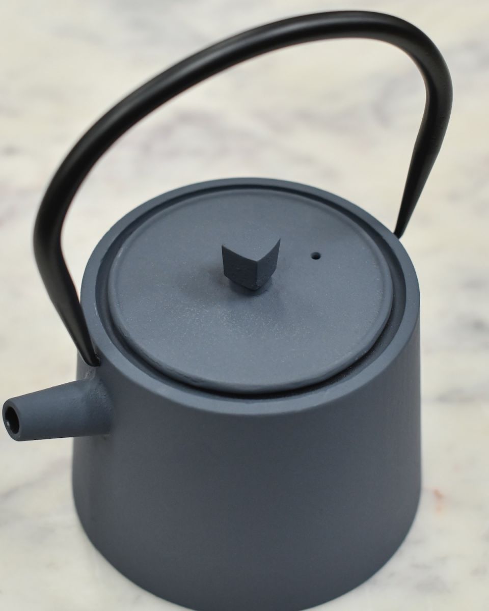 Close up of lid and handle detail on slate grey teapot