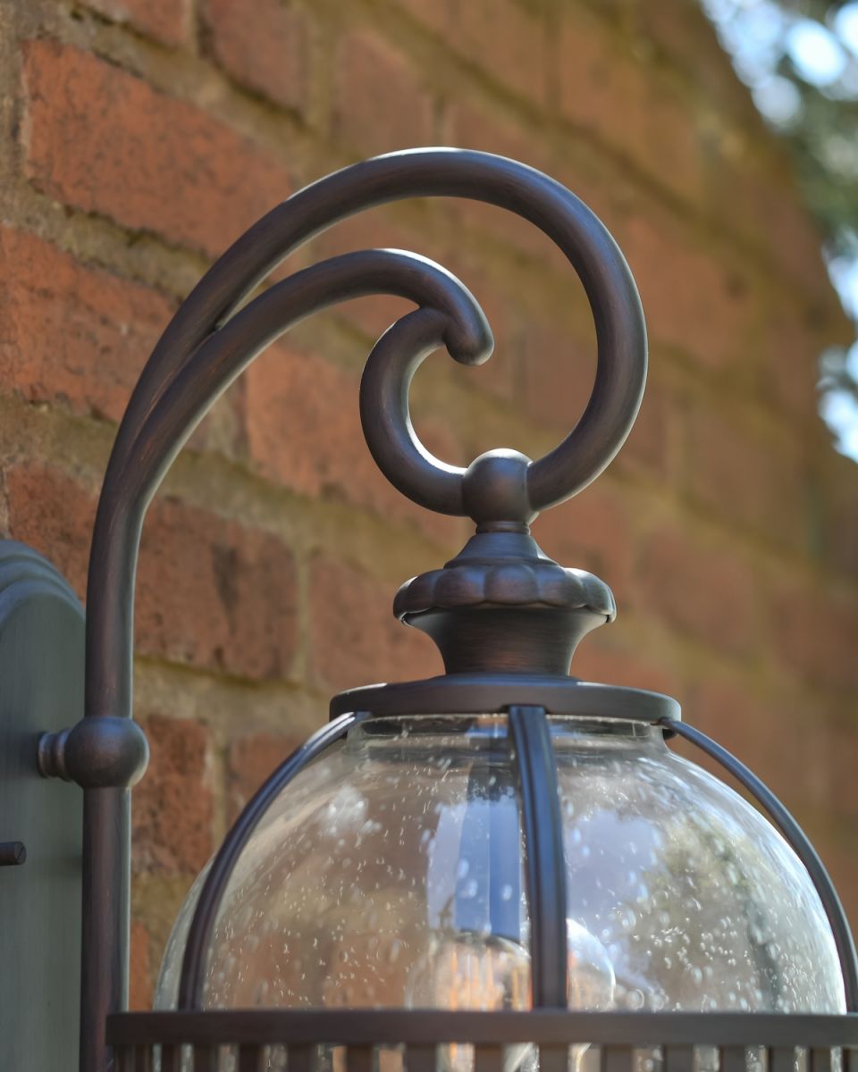 Close up of ornate detail on Aged Bronze "Classical" Victorian Spherical Twin Bulb Wall Light - 49cm