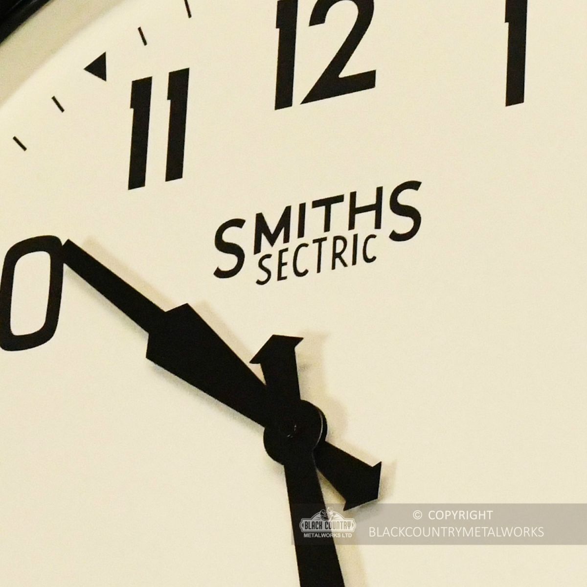 Close Up Of Smiths Wall Clock Cream Face