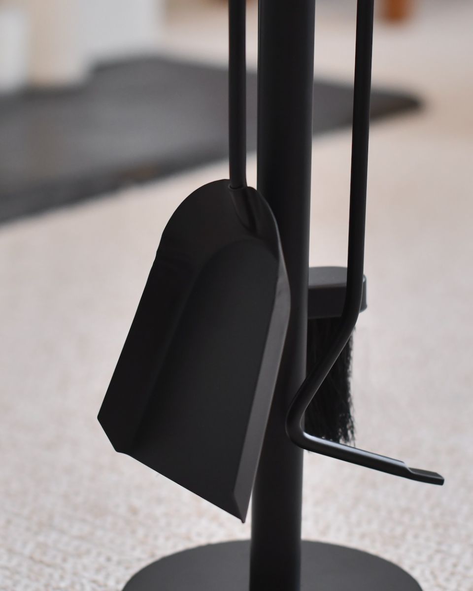 Close up of shovel on fireside companion set