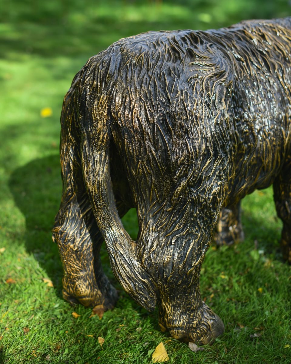 Close up of tail detail on highland cow outdoor sculpture