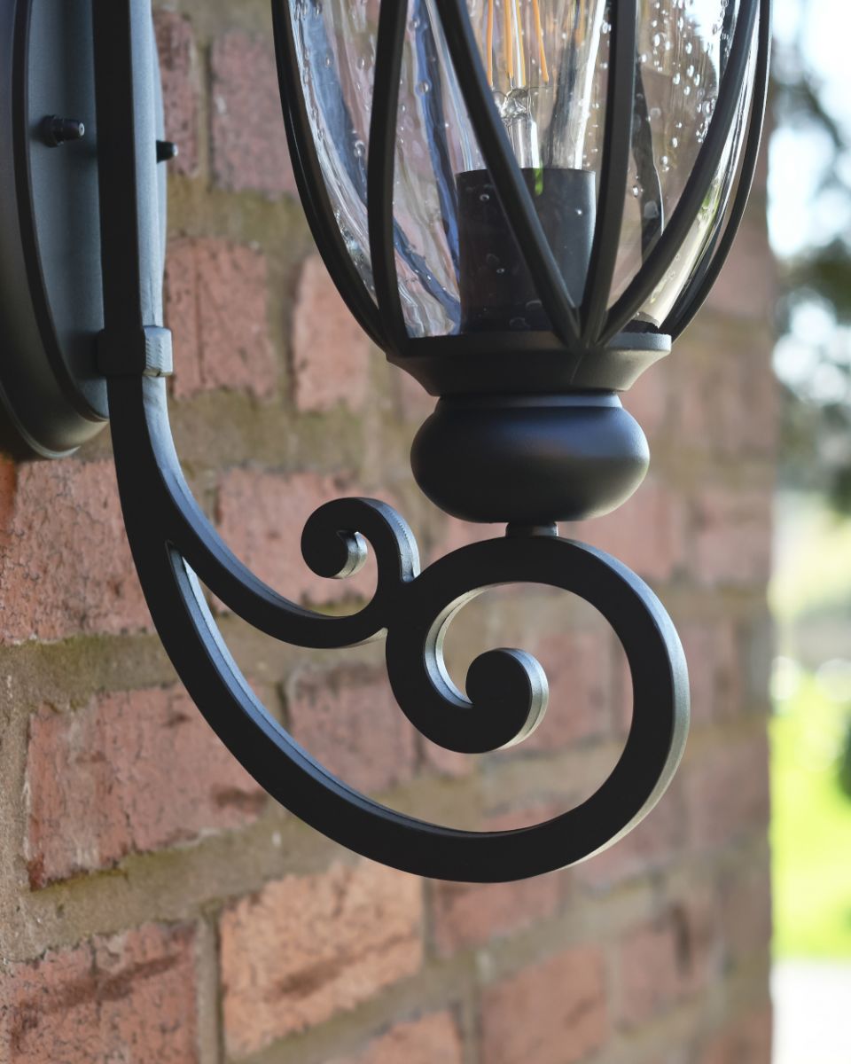 Close Up Of The Ornate Bracket On The Large Wall Light