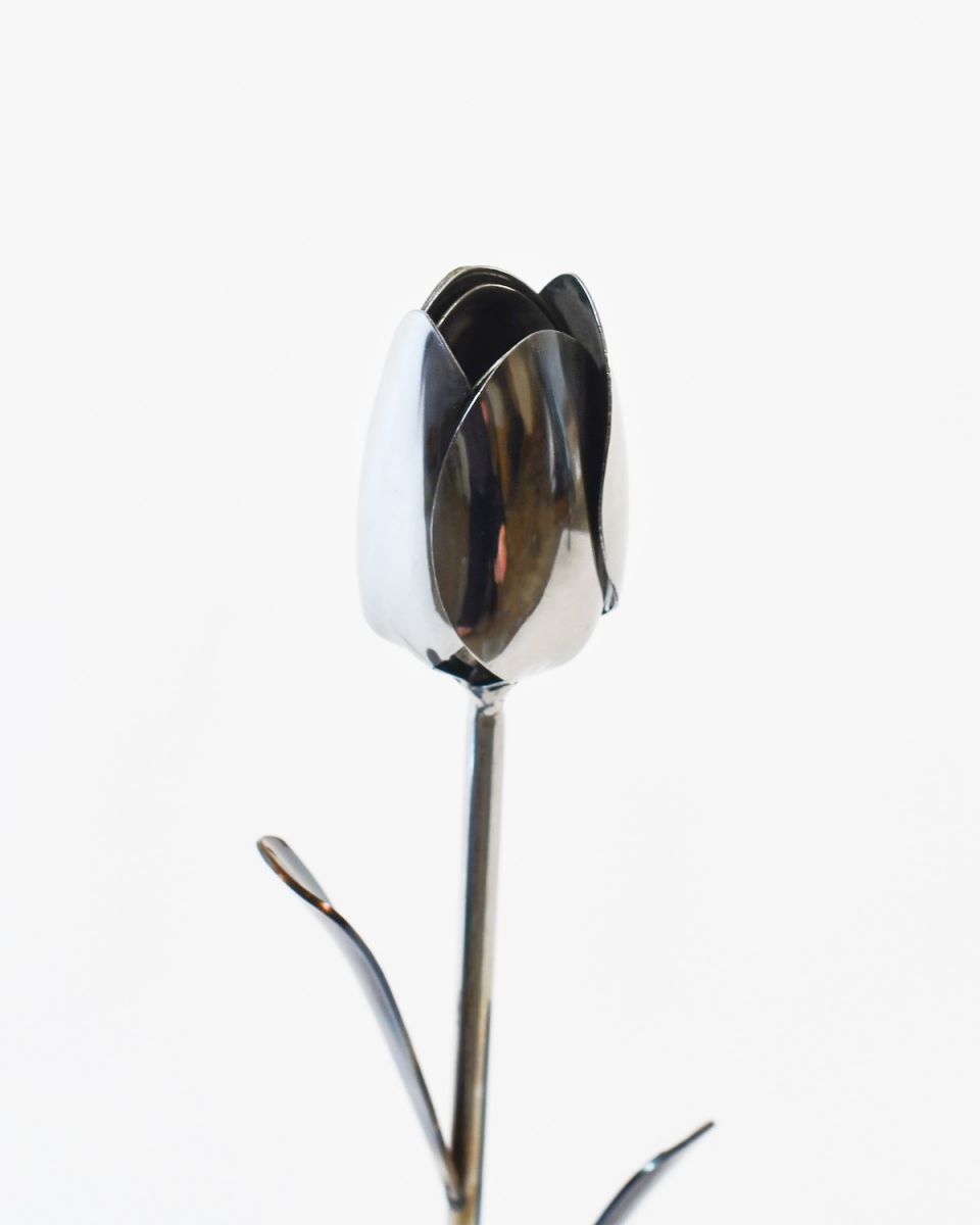 Close up of tulip head detail on recycled metal art sculpture
