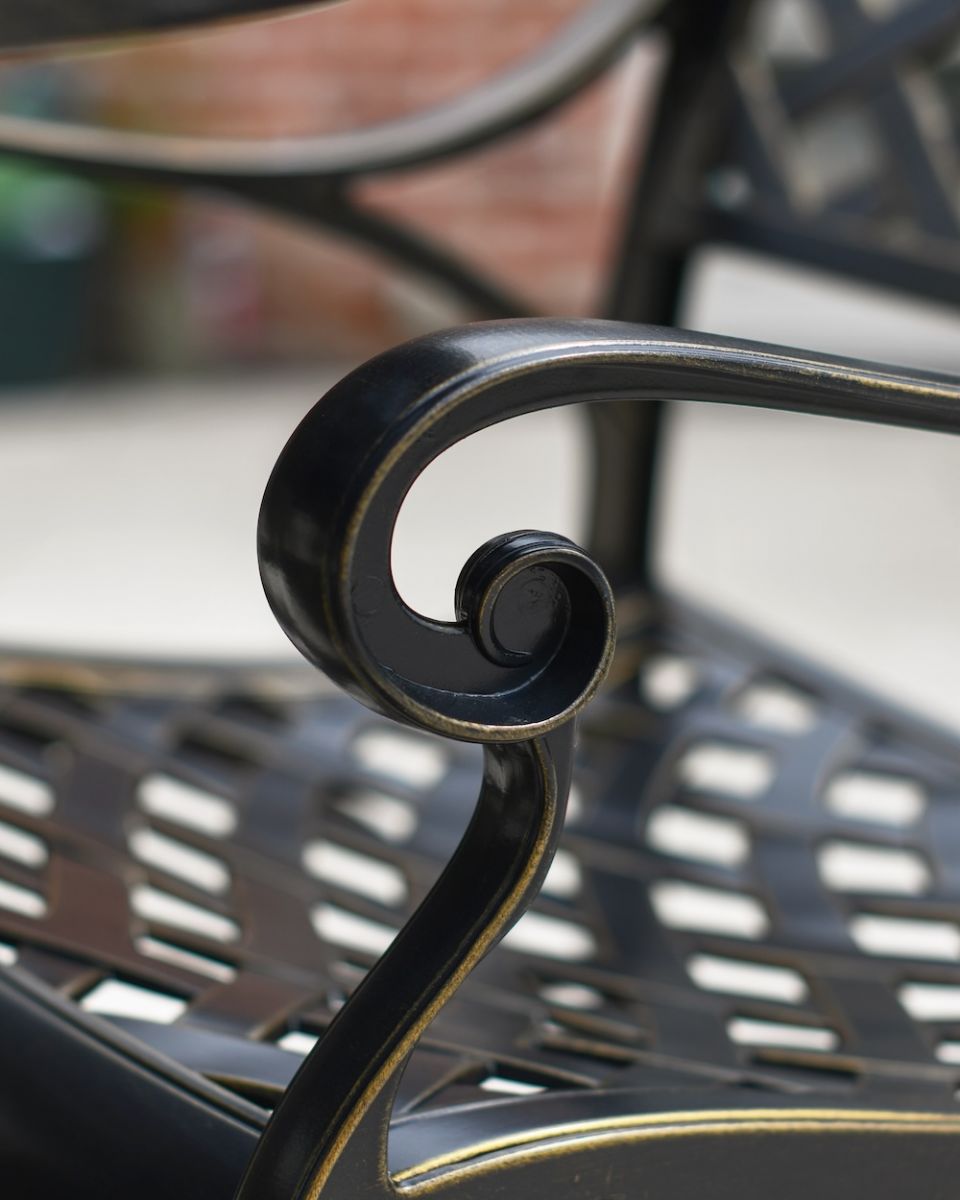 close up of ornate detail on chair dining set
