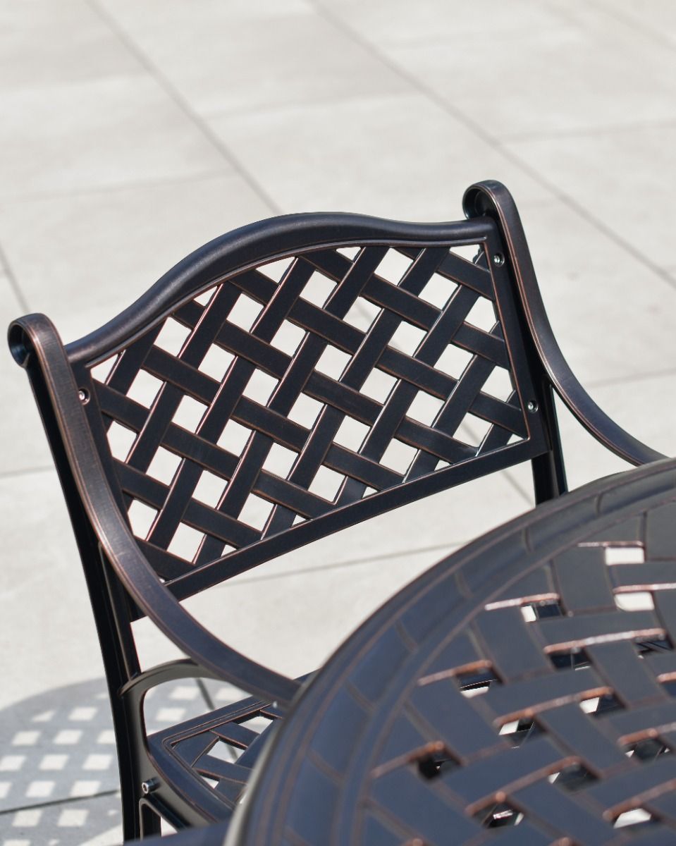 Lattice pattern backrest of chair from Milford furniture set 