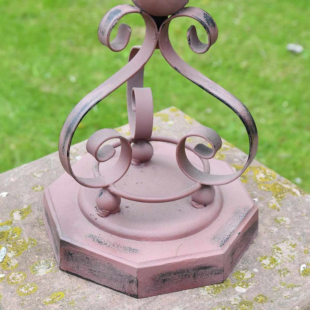 Close-up of the Ornate Scrolled Base