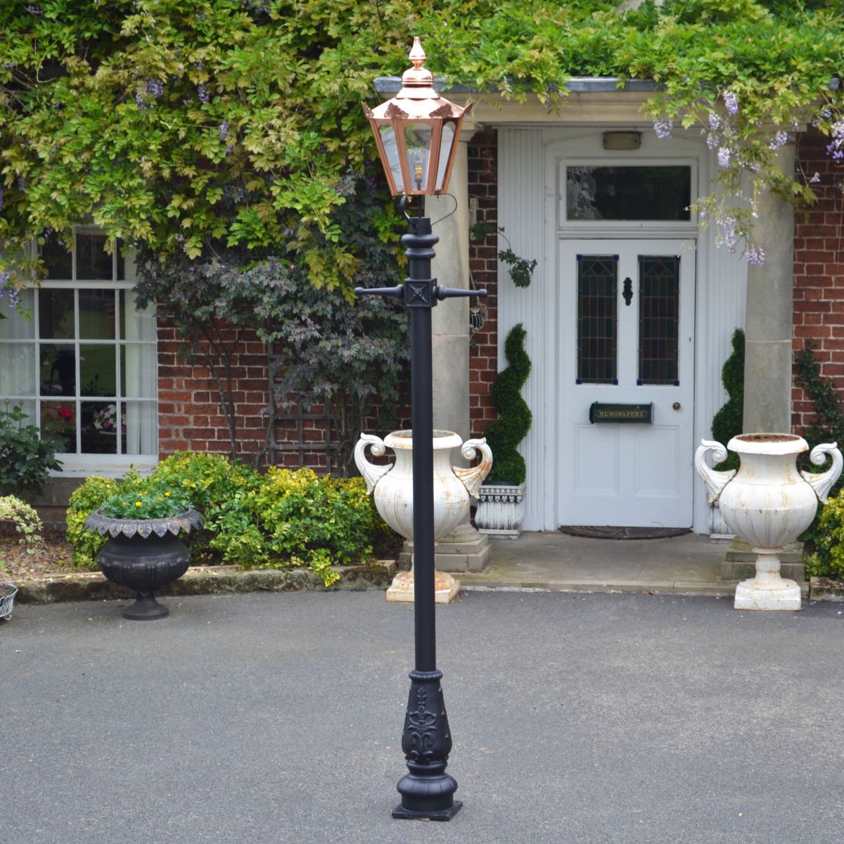 Copper Concordia Hexagonal Lantern on Driveway