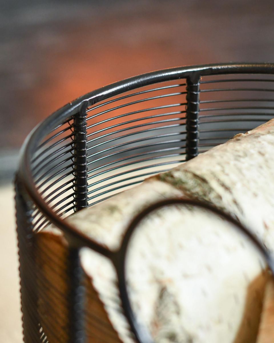 Close Up Of Black Contemporary "Oval" Design Log Holder Edges