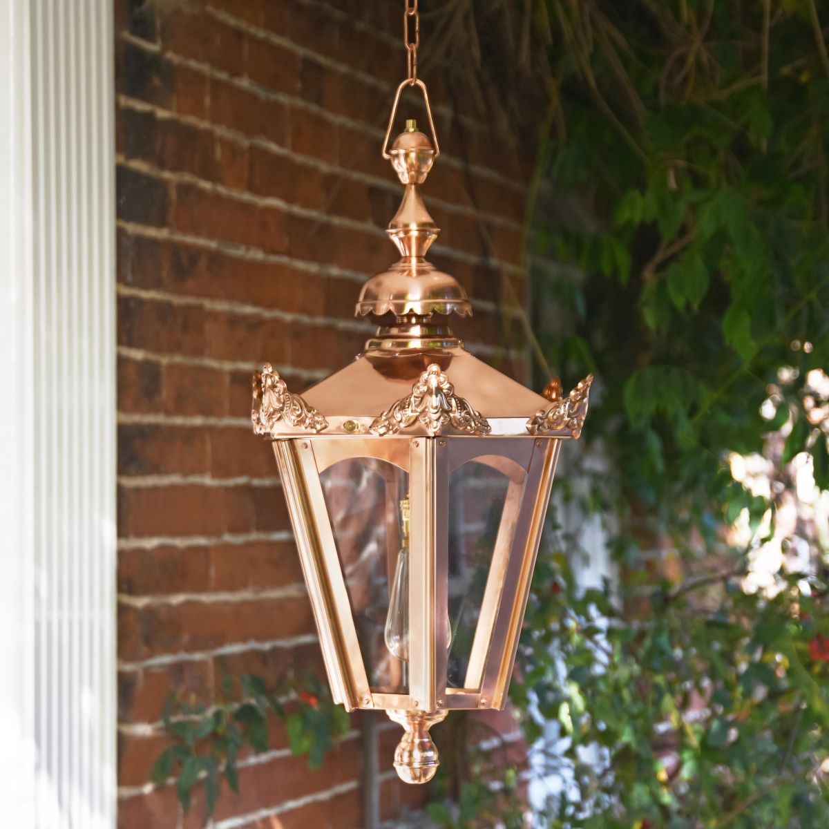 Copper Chain Hanging Porch Lantern in Situ Underneath a porch
