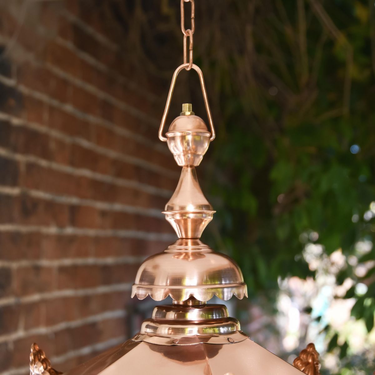 Close-up of the Chain Hanging Fixing Connected to the Traditional Copper Lantern