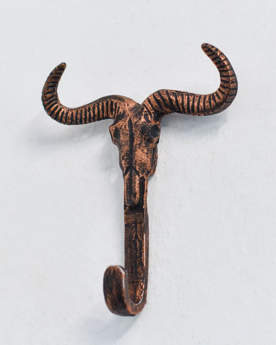 Angled view of copper detail rustic charm coat hook