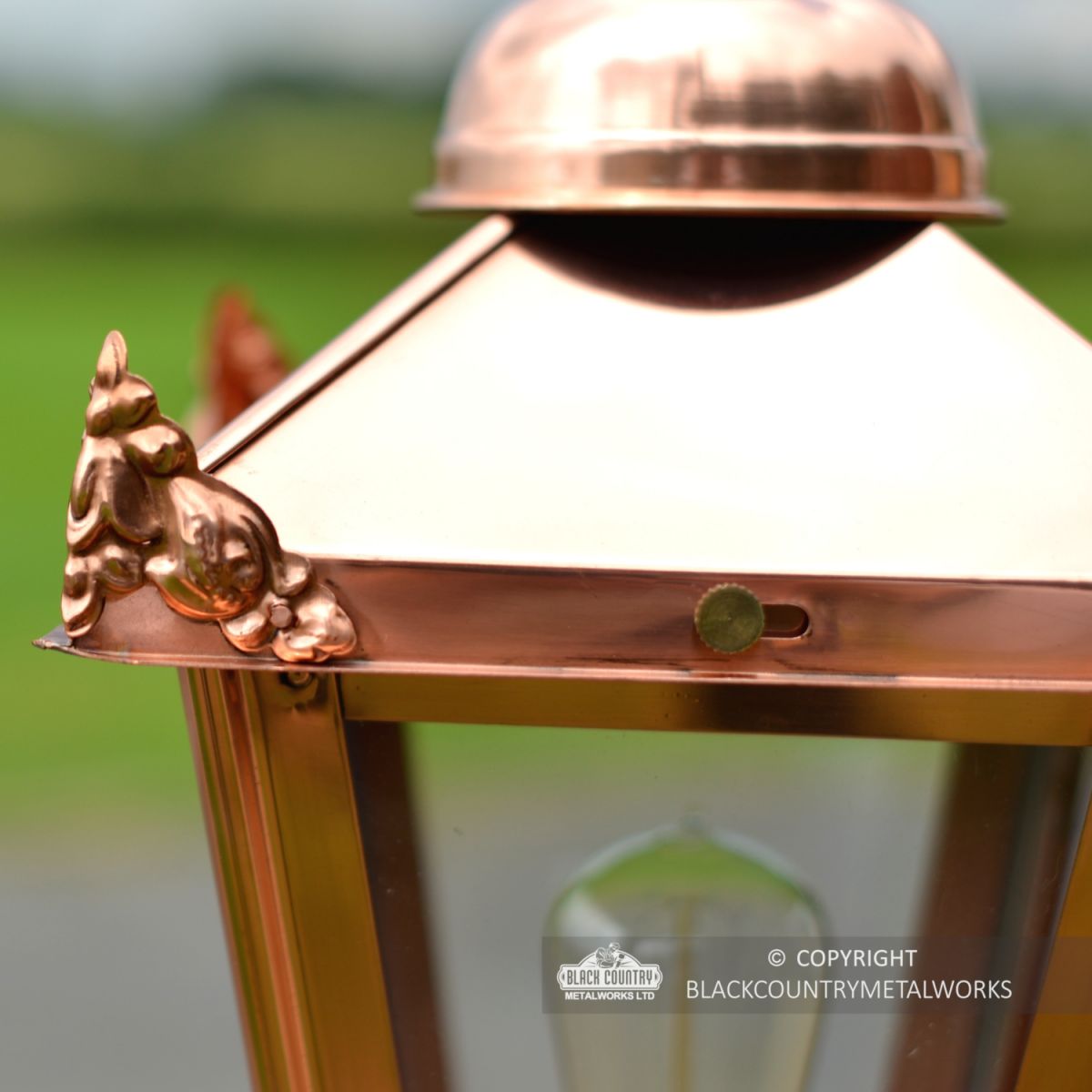 Decorative Wings on the Lid of the Lantern 