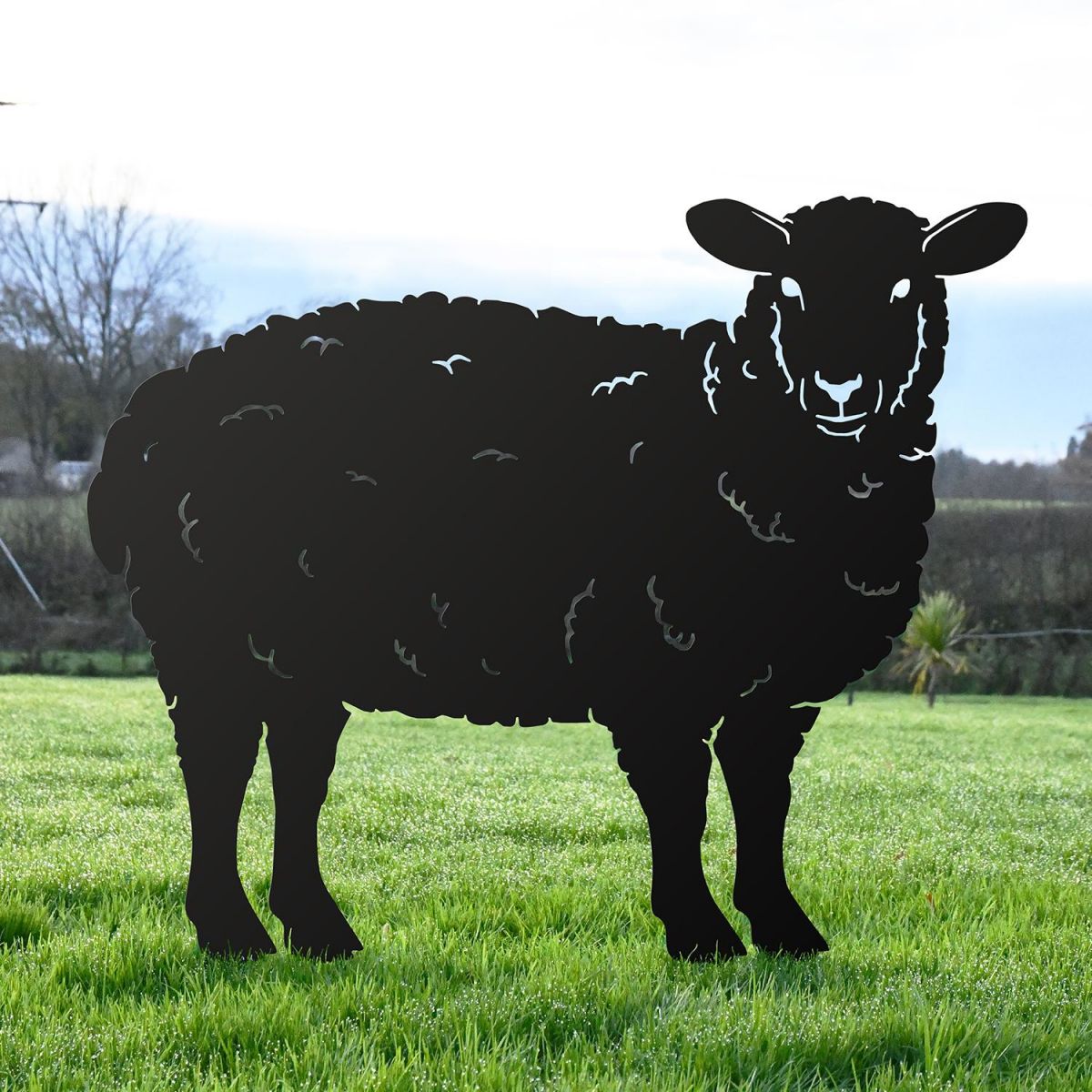 Black Iron Curly Sheep Silhouette in Situ in the Garden