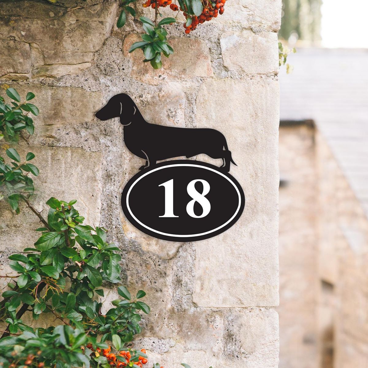 Bespoke Dachshund Iron House Number Sign on a Garden Wall