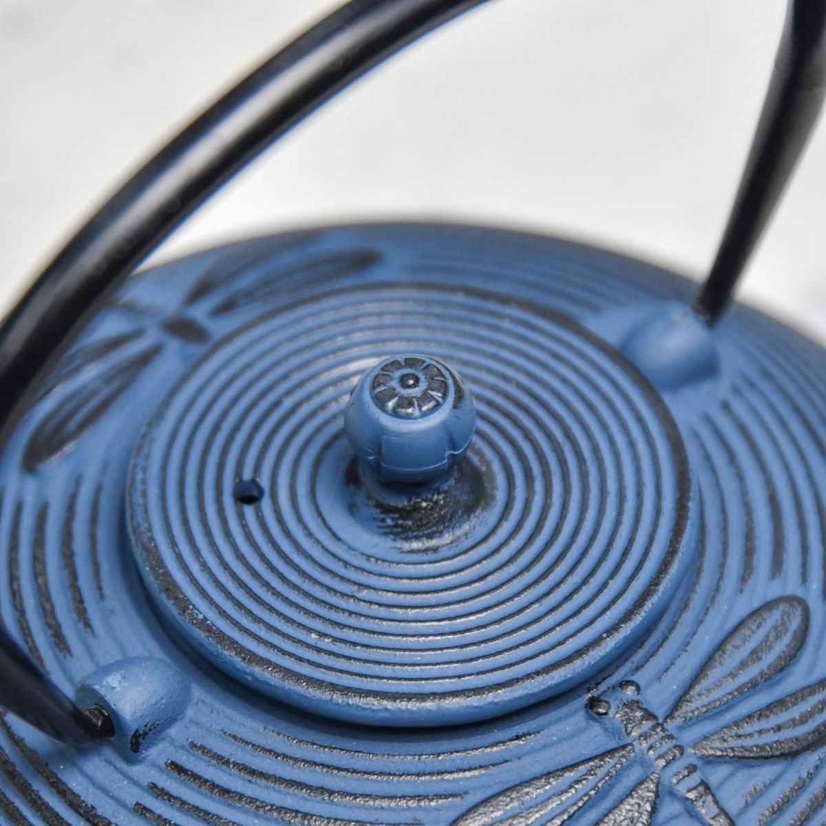 Close-Up of Dark Blue "Dragonfly" Cast Iron Teapot in Situ with Closed Lid