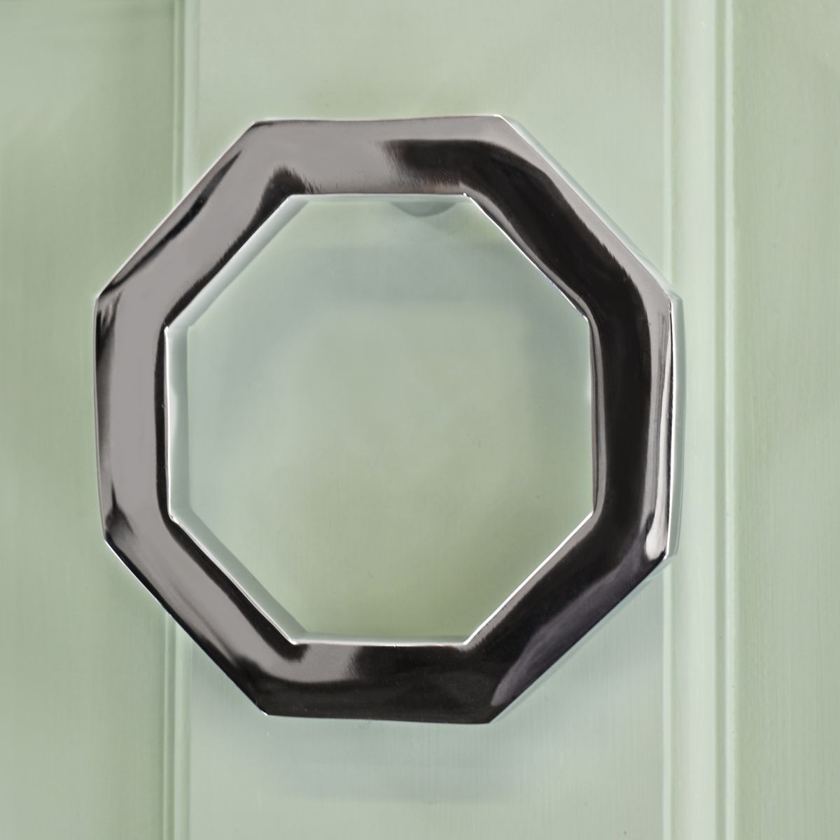 Bright Chrome Modern Octagonal door knocker on Green door