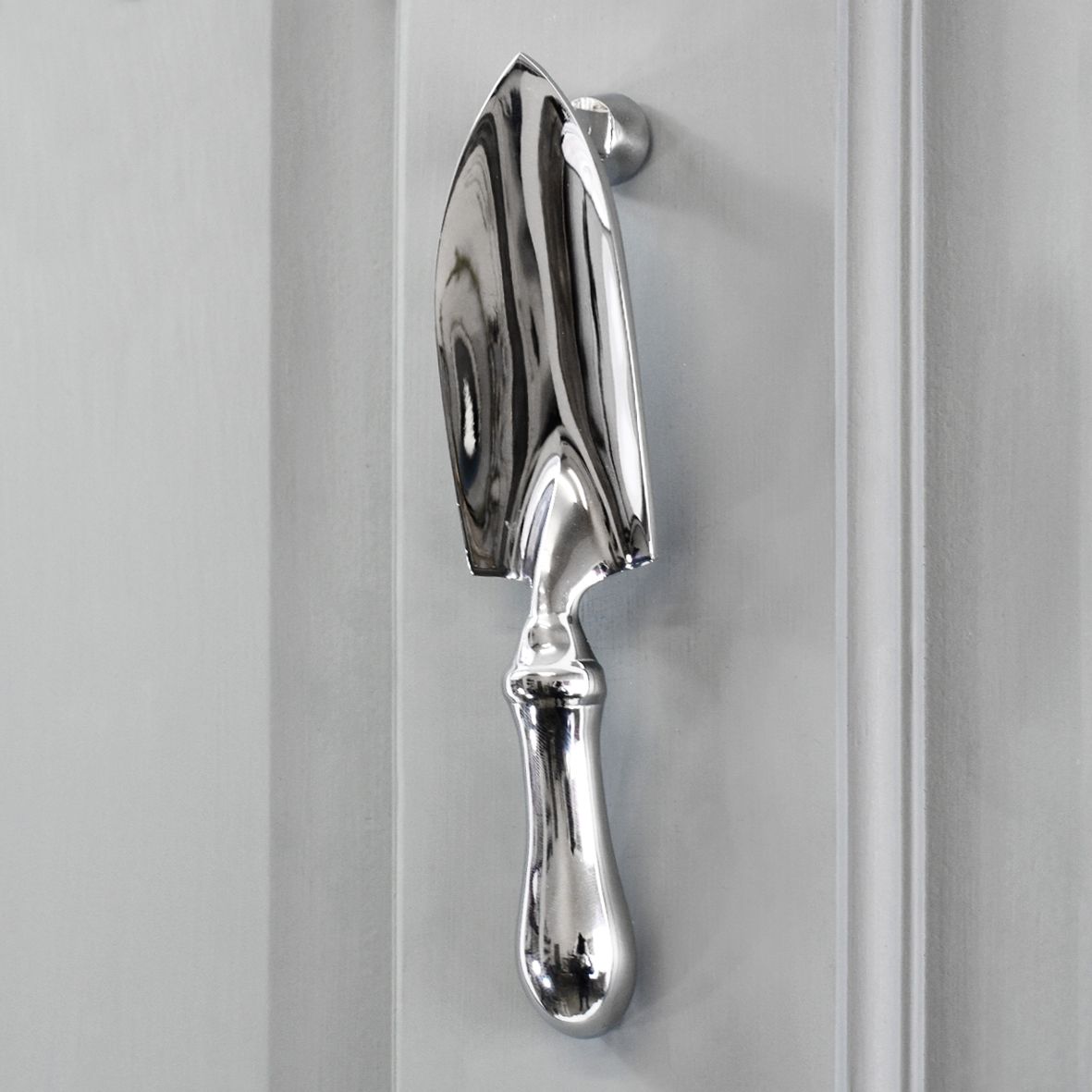 Bright Chrome Trowel Door Knocker on Grey door