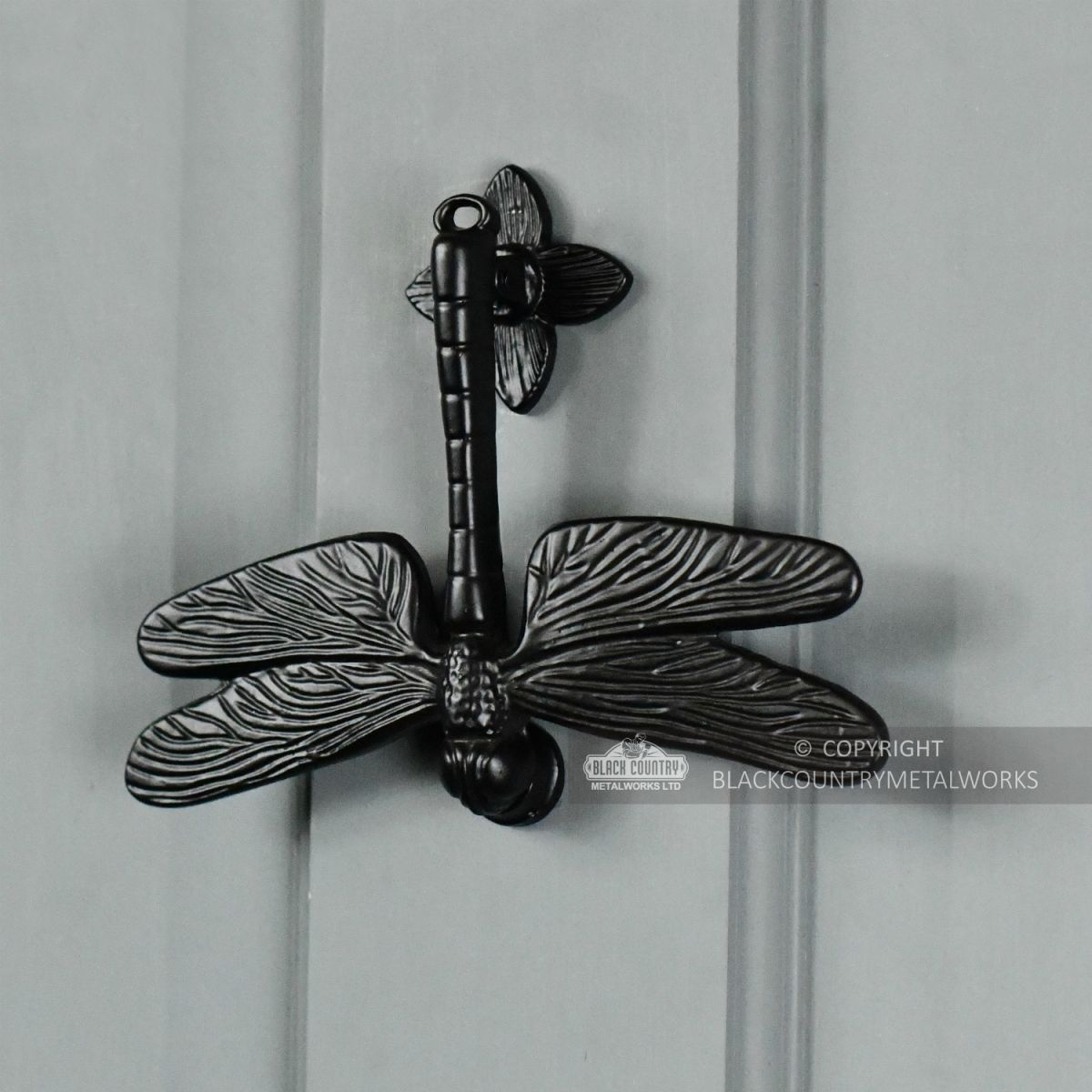 Dragonfly Door Knocker - Cast Iron On Grey Door