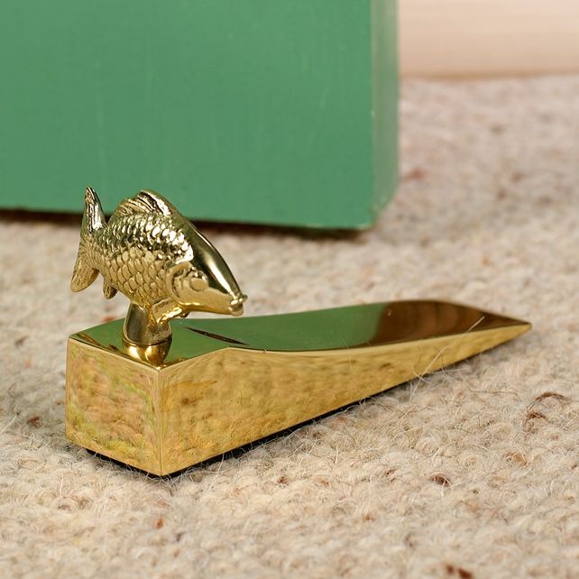 Novelty Fishy door wedge finished in polished brass