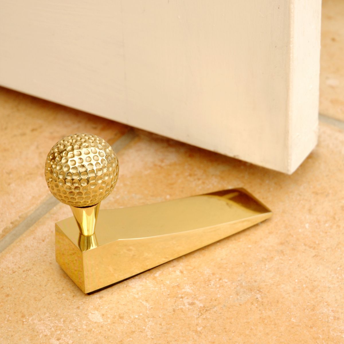 Solid Brass door wedge with gold ball finial