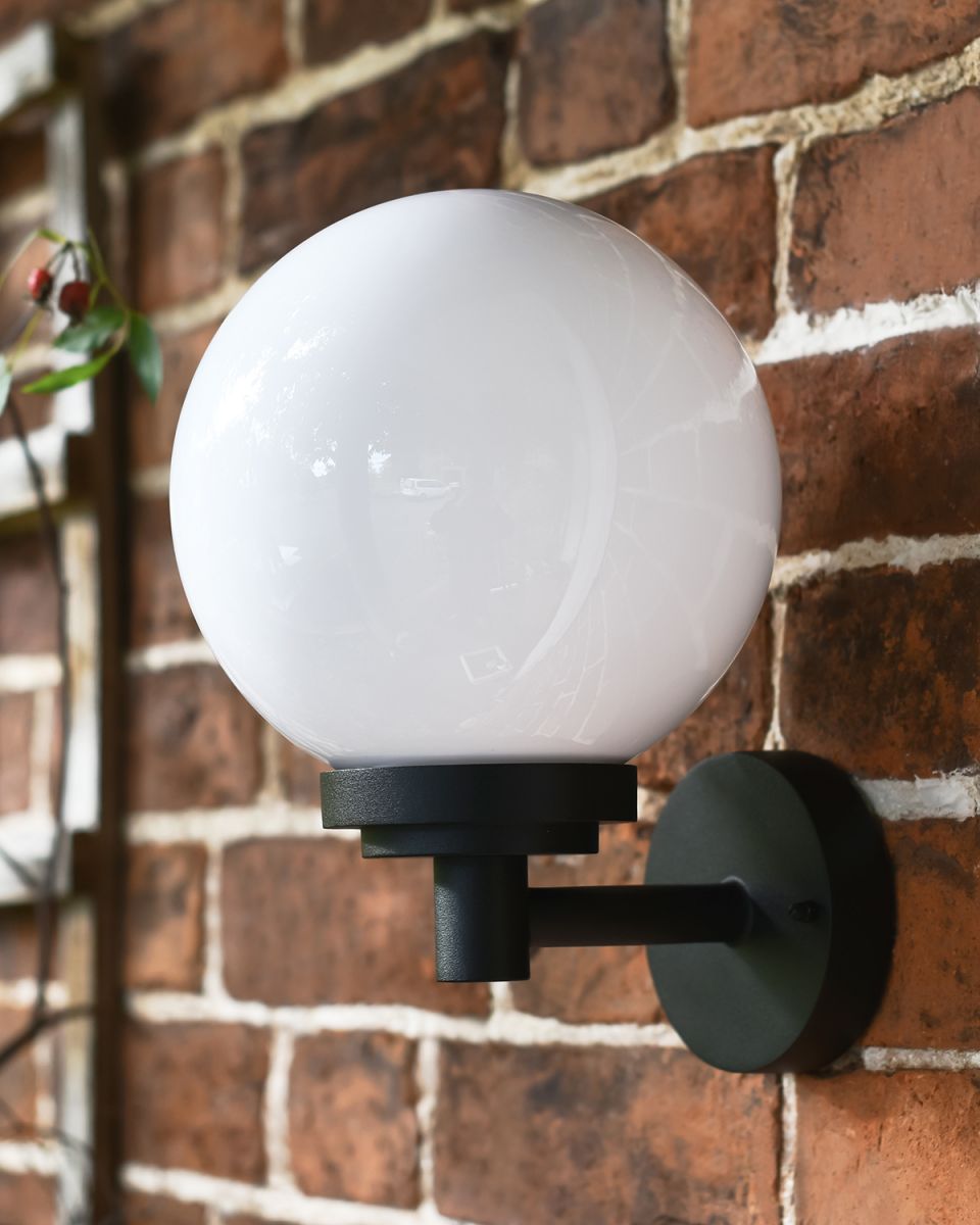 Elmbridge Traditional Globe Wall Light in Situ Mounted onto a Brick Wall