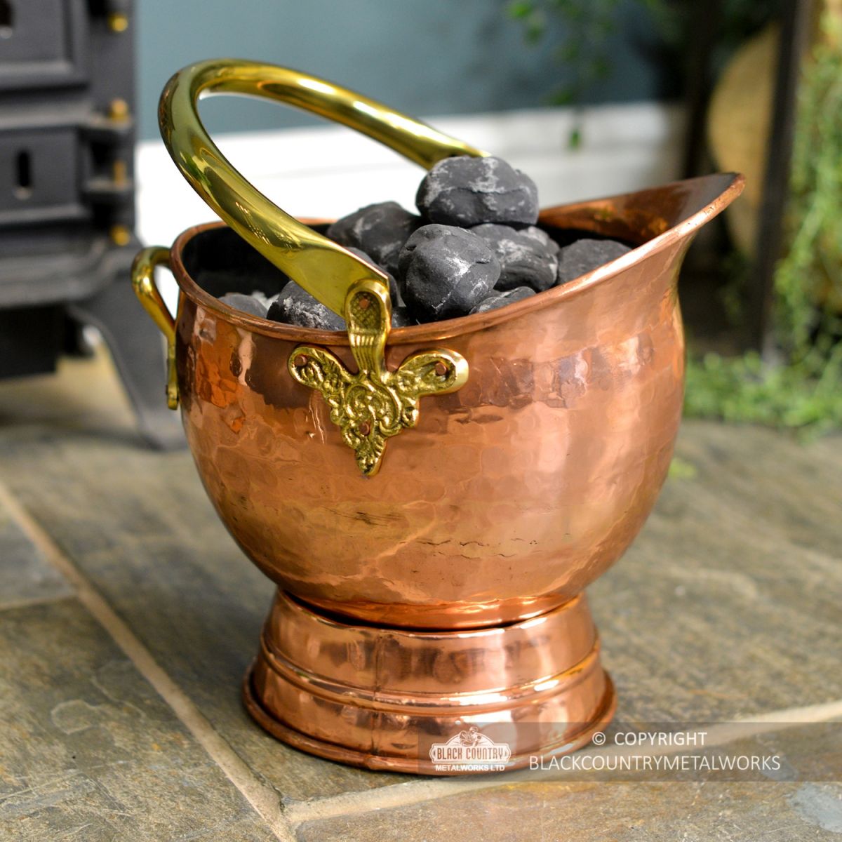 Traditional Copper Coal Bucket Holding Coal
