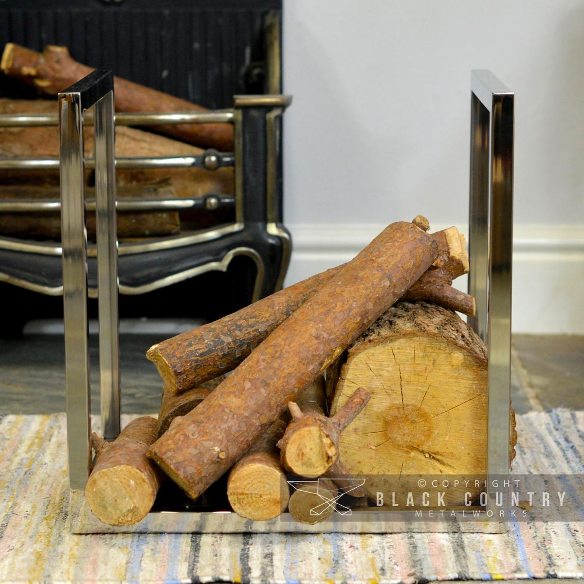 "Kresling Hall" Log Holder in Finished in Stainless Steel 